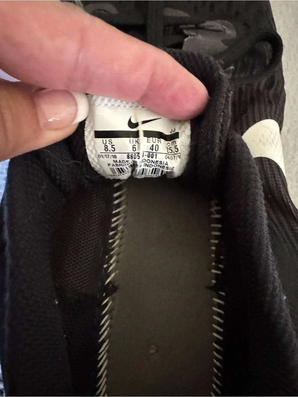 Nike Black Athletic Running Shoes with White Swoosh